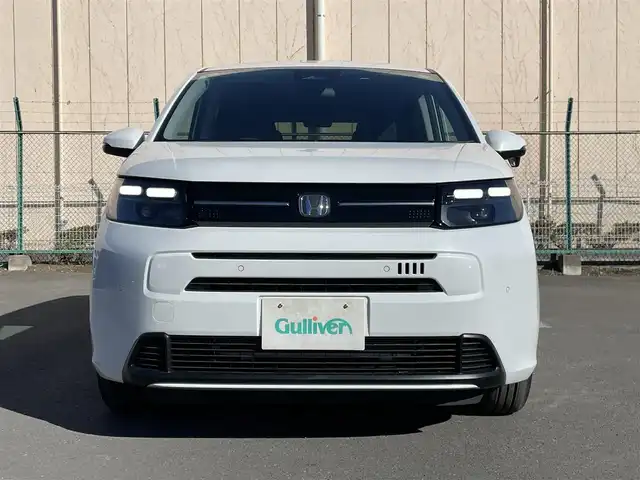 ホンダ フリード AIR EX 東京都 2025(令7)年 0.1千km プラチナホワイトパール 登録済み未使用車/純正9インチナビ/Bluetooth/USB/バックカメラ/TV/両側電動スライドドア/レーダークルーズコントロールシステム/シートヒーター/純正アルミホイール/ABS/横滑り防止装置/レーンアシスト/オートライト/純正LED/衝突被害軽減システム/BSM