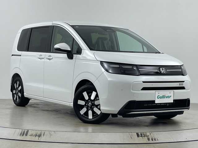 ホンダ フリード AIR EX 埼玉県 2025(令7)年 0.1千km プラチナホワイトパール 純正ナビ　/バックカメラ/BSM/シートヒーター/両側パワースライドドア　/コーナーセンサー　/衝突軽減ブレーキ　/レーンキープアシスト　/レーダークルーズコントロール　/横滑り防止措置　/ＥＣＯＮ