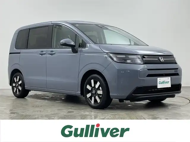 ホンダ フリード AIR EX 埼玉県 2025(令7)年 0.1千km ソニックグレーパール 登録済み未使用車/純正9インチナビ/ホンダセンシング/　Bluetooth　AppleCarPlay　地デジTV/全方位カメラ/両側パワースライドドア/レーダークルーズコントロール/衝突被害軽減ブレーキ/ハーフレザーシート/シートヒーター/リヤエアコン/純正15インチアルミホイール