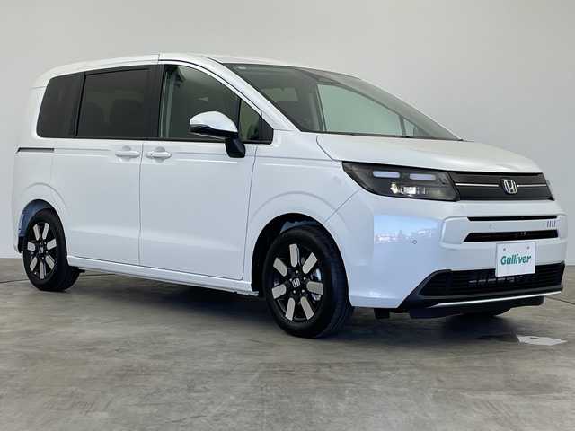 ホンダ フリード AIR EX 群馬県 2025(令7)年 0.1千km プラチナホワイトパール 登録済未使用車　純正9型ナビ　全周囲カメラ　マルチビューカメラシステム　後退出庫サポート　アダプティブクルーズコントロール　両側電動スライドドア　シートヒーター　BSM　LED　衝突被害軽減ブレーキ　禁煙車