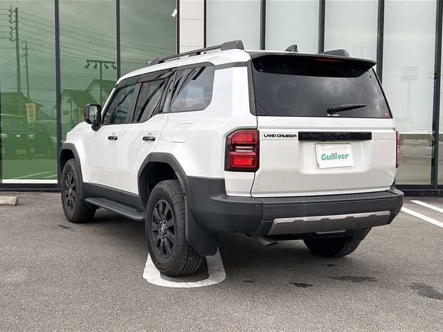 トヨタ ランドクルーザー ２５０ ZX ファーストエディション 岐阜県 2024(令6)年 1.3万km プラチナホワイトパールマイカ 登録時走行距離12427km/純正ナビ/全方位モニター/フルセグテレビ/電動格納サードシート/ハンドルヒーター/JBLサウンド/パドルシフト/サイドステップ/ドアバイザー/純正フロアマット/純正アルミホイール/レザーシート/ETC/シートヒーター/エアシート/レザーシート/ヘッドライトウォッシャー/禁煙車/LEDヘッドライト/ルーフレール/サンルーフ/オートマチックハイビーム/スマートキー/プッシュスタート