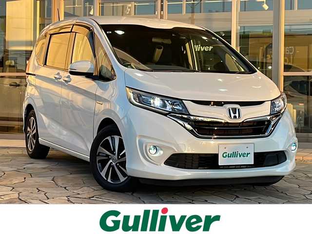 ホンダ フリード＋ ハイブリット G ホンダセンシング 静岡県 2019(令1)年 10万km ホワイトオーキッドパール 純正ナビ/CD/DVDAM/FM/フルセグTV/SD/Bluetooth/Apple Carplay/主要装備/・両側パワースライドドア　/・ドライブレコーダー　/・バックカメラ　/・ＥＴＣ　/・レーダークルーズコントロール　/・スマートキー　/・スペアキー　/・プッシュスタート　/・保証書　/・取扱説明書　/・レーンキープ　/・ＬＥＤライト/・フォグランプ/・ステアリングリモコン/・オートライト/・横滑り防止装置/・衝突軽減システム