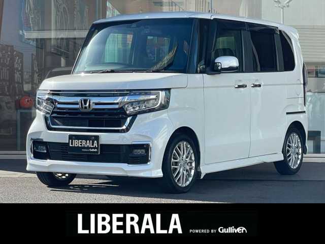 ホンダ Ｎ ＢＯＸ カスタム L ターボ 鹿児島県 2021(令3)年 4.1万km プラチナホワイトパール 純正ギャザーズナビ(WX-211C)/純正CD/ワンセグTV/バックカメラ/前後ドライブレコーダー/追従型クルーズコントロール/両側パワースライドドア/前席シートヒーター/ハーフレザーシート/純正フロアマット/後コーナーセンサー/オートライト/衝突軽減ブレーキ/レーンキープアシスト/純正15インチアルミ/LEDヘッドライト/電動格納ミラー/ライトレベライザー/ドアバイザー/取扱説明書