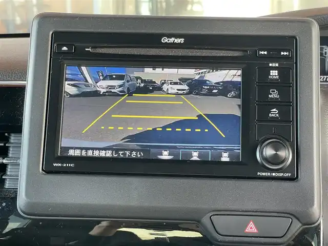 ホンダ Ｎ ＢＯＸ カスタム L ターボ 鹿児島県 2021(令3)年 4.1万km パール 純正ギャザーズナビ(WX-211C)/純正CD/ワンセグTV/バックカメラ/前後ドライブレコーダー/追従型クルーズコントロール/両側パワースライドドア/前席シートヒーター/ハーフレザーシート/純正フロアマット/後コーナーセンサー/オートライト/衝突軽減ブレーキ/レーンキープアシスト/純正15インチアルミ/LEDヘッドライト/電動格納ミラー/ライトレベライザー/ドアバイザー/取扱説明書