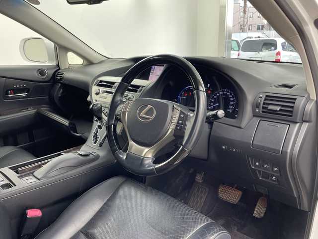 レクサス ＲＸ 450h バージョンL 兵庫県 2012(平24)年 10.9万km ホワイトパールクリスタルシャイン ・4WD/・純正HDDナビ＆フルセグ＆BT＆USB＆DVD/・バックカメラ/・サイドカメラ/・黒革シート/・前席シートヒーター/・前席シートベンチレーション/・前席パワーシート/・前席メモリーシート/・ステアリングヒーター/・ステアリングリモコン/・クルーズコントロール/・パワーバックドア/・ヘッドライトウォッシャー/・ヘッドアップディスプレイ/・スマートキー/・スペアキー/・プッシュスタート/・ビルトインETC/・横滑り防止装置