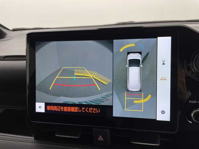 トヨタ ノア ハイブリッド S－Z 鹿児島県 2025(令7)年 0.4万km ホワイトパールクリスタルシャイン 純正ナビ/パノラマビューモニター/シートヒーター/ＣＤ/ＤＶＤ/ＨＤＭＩ/フルセグテレビ/BSM/オットマン/レーダークルーズコントロール/オートライト/プリクラッシュセーフティ/ＥＴＣ2/0/ハーフレザーシート/レーンキープ/パワーバックドア/オートハイビーム/両側パワースライドドア