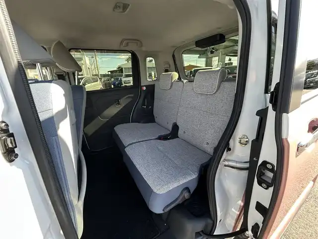 ダイハツ ムーヴ キャンバス ストライプス G 愛知県 2023(令5)年 2.1万km シャイニングホワイトパール/アプリコットピンクメタリック スマートアシスト/　・プリクラッシュセーフティ/　・車線逸脱警報システム/　・先行者発進お知らせ機能/両側パワースライドドア/シートヒーター（全席）/電動パーキングブレーキ/ドライブレコーダー（前後）/ホットカップホルダー（前席）/社外ディスプレイオーディオ/　・Bluetooth/　・CD/DVD/　・AM/FM/　・USB/　・iPod/　・AUX/　・AndroidAuto/社外フロアマット/コーナーセンサー（前後）/LEDヘッドライト/オートライト/カーテンエアバック/ETC/スマートキー/スペアキー×１/取扱説明書/保証書