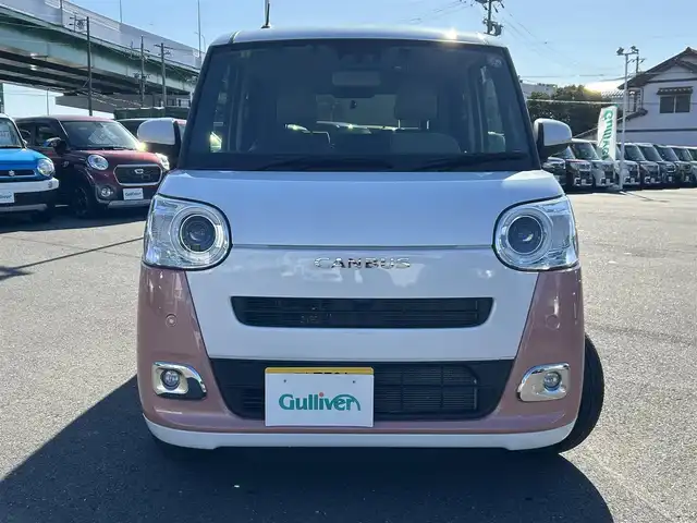 ダイハツ ムーヴ キャンバス ストライプス G 愛知県 2023(令5)年 2.1万km シャイニングホワイトパール/アプリコットピンクメタリック スマートアシスト/　・プリクラッシュセーフティ/　・車線逸脱警報システム/　・先行者発進お知らせ機能/両側パワースライドドア/シートヒーター（全席）/電動パーキングブレーキ/ドライブレコーダー（前後）/ホットカップホルダー（前席）/社外ディスプレイオーディオ/　・Bluetooth/　・CD/DVD/　・AM/FM/　・USB/　・iPod/　・AUX/　・AndroidAuto/社外フロアマット/コーナーセンサー（前後）/LEDヘッドライト/オートライト/カーテンエアバック/ETC/スマートキー/スペアキー×１/取扱説明書/保証書