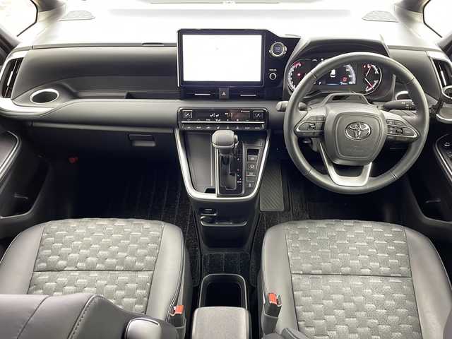 トヨタ ヴォクシー S－Z 大阪府 2022(令4)年 2.5万km グリッターブラックガラスフレーク 純正10.5インチディスプレイオーディオ/【ナビ/BT/フルセグTV/USB/DVD/HDMI]/バックカメラ/ETC2.0/ドライブレコーダー前後　TZ-DR210/快適利便パッケージ/・オットマン/・パワーバックドア/・ハンズフリーデュアルパワースライドドア/・ナイノーX/・ステアリングヒーター/・二列目シートヒーター/両側パワースライドドア/衝突被害軽減システム/ブラインドスポットモニター/クルーズコントロール追従/コーナーセンサー前後/オートライト/サンシェード/ハーフレザーシート/純正17インチAW/ワンオーナ/スペアキー