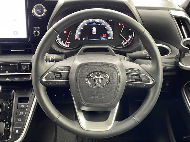 トヨタ ヴォクシー S－Z 大阪府 2022(令4)年 2.5万km グリッターブラックガラスフレーク 純正10.5インチディスプレイオーディオ/【ナビ/BT/フルセグTV/USB/DVD/HDMI]/バックカメラ/ETC2.0/ドライブレコーダー前後　TZ-DR210/快適利便パッケージ/・オットマン/・パワーバックドア/・ハンズフリーデュアルパワースライドドア/・ナイノーX/・ステアリングヒーター/・二列目シートヒーター/両側パワースライドドア/衝突被害軽減システム/ブラインドスポットモニター/クルーズコントロール追従/コーナーセンサー前後/オートライト/サンシェード/ハーフレザーシート/純正17インチAW/ワンオーナ/スペアキー