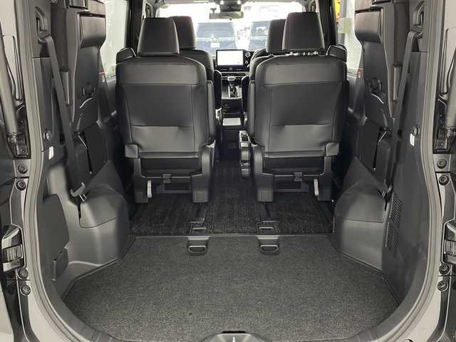 トヨタ ヴォクシー S－Z 大阪府 2022(令4)年 2.5万km グリッターブラックガラスフレーク 純正10.5インチディスプレイオーディオ/【ナビ/BT/フルセグTV/USB/DVD/HDMI]/バックカメラ/ETC2.0/ドライブレコーダー前後　TZ-DR210/快適利便パッケージ/・オットマン/・パワーバックドア/・ハンズフリーデュアルパワースライドドア/・ナイノーX/・ステアリングヒーター/・二列目シートヒーター/両側パワースライドドア/衝突被害軽減システム/ブラインドスポットモニター/クルーズコントロール追従/コーナーセンサー前後/オートライト/サンシェード/ハーフレザーシート/純正17インチAW/ワンオーナ/スペアキー