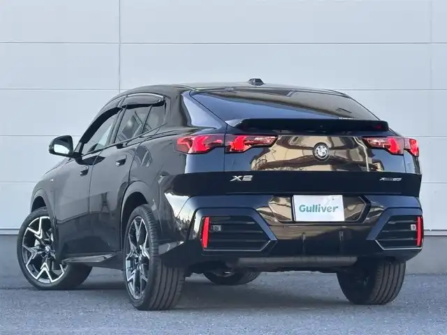 ＢＭＷ ＢＭＷ Ｘ２ xDrive 20i Mスポーツ 茨城県 2024(令6)年 1.4万km サファイアブラックP 純正ナビ/　(AM/FM/Bluetooth/AppleCarPlay)/Connected Drive/　(YouTube/Disney＋/Alexa)/全方位カメラ/全方位ドライブレコーダー/ミラー内蔵型ETC/アンビエントライト/ブラインドスポットモニター/ヘッドアップディスプレイ/前後コーナーセンサー/電動リアゲート/ハーフレザーシート/ハンドルヒーター/シートヒーター(D＋N席)/パワーシート(D＋N席)/純正フロアマット/純正アルミホイール/LEDヘッドライト/プッシュスタート