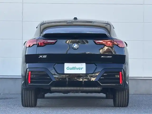 ＢＭＷ ＢＭＷ Ｘ２ xDrive 20i Mスポーツ 茨城県 2024(令6)年 1.4万km サファイアブラックP 純正ナビ/　(AM/FM/Bluetooth/AppleCarPlay)/Connected Drive/　(YouTube/Disney＋/Alexa)/全方位カメラ/全方位ドライブレコーダー/ミラー内蔵型ETC/アンビエントライト/ブラインドスポットモニター/ヘッドアップディスプレイ/前後コーナーセンサー/電動リアゲート/ハーフレザーシート/ハンドルヒーター/シートヒーター(D＋N席)/パワーシート(D＋N席)/純正フロアマット/純正アルミホイール/LEDヘッドライト/プッシュスタート