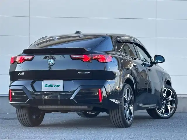 ＢＭＷ ＢＭＷ Ｘ２ xDrive 20i Mスポーツ 茨城県 2024(令6)年 1.4万km サファイアブラックP 純正ナビ/　(AM/FM/Bluetooth/AppleCarPlay)/Connected Drive/　(YouTube/Disney＋/Alexa)/全方位カメラ/全方位ドライブレコーダー/ミラー内蔵型ETC/アンビエントライト/ブラインドスポットモニター/ヘッドアップディスプレイ/前後コーナーセンサー/電動リアゲート/ハーフレザーシート/ハンドルヒーター/シートヒーター(D＋N席)/パワーシート(D＋N席)/純正フロアマット/純正アルミホイール/LEDヘッドライト/プッシュスタート