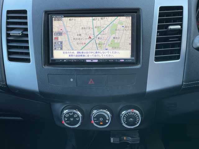 三菱 アウトランダー 24G 神奈川県 2009(平21)年 7.6万km ミディアムパープリッシュグレーマイカ メモリナビ/フルセグテレビ/クルーズコントロール/ETC/コーナーセンサー/電動格納ミラー/パドルシフト/オートライト/フォグランプ/純正ドアバイザー/純正フロアマット