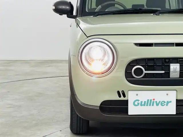 スズキ ラパン ＬＣ X 福島県 2022(令4)年 2.2万km トラッドカーキメタリック/アーバンブラウン 2トーン デュアルカメラブレーキサポート/・横滑り防止機能/・レーンキープアシスト/純正8インチナビ/・型番；CN-FZ886/・CD/DVD/BT/USB/USB/HDMI/iPod/FM/AM/シートヒーター/LEDヘッドライト/純正アルミホイール付きサマータイヤ/ステアリングリモコン/プッシュスタート/・スマートキー