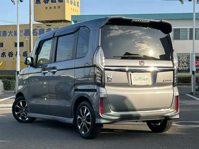 ホンダ Ｎ ＢＯＸ カスタム G L ホンダセンシング 愛媛県 2019(平31)年 5.3万km シャイニンググレーM 社外ナビ（Panasonic製）/BT/AM・FM/CD/DVD/フルセグTV/ビルトインETC/前後ドライブレコーダー/バックカメラ/コーナーセンサー/クルーズコントロール/衝突軽減システム/レーンキープアシスト/横滑り防止装置/片側パワースライドドア/後席フルフラットシート/LEDヘッドライト/フォグランプ/純正アルミホイール