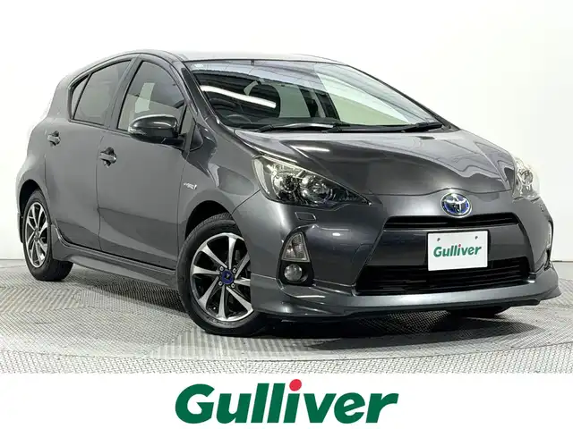 トヨタ アクア G ブラックソフトレザーセレ 大阪府 2014(平26)年 6.9万km グレーメタリック 黒革シート 純正エアロ モデリスタ15incAW 純正ナビTV バックカメラ スマートキー プッシュスタート アイドリングストップ オートライト オートエアコン ETC ワンオーナー