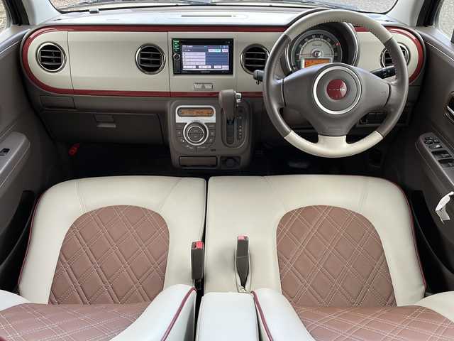 スズキ ラパン ショコラ X 新潟県 2013(平25)年 5.3万km シャンパンピンクPM 社外SDナビ(MDV-L300)/CD/DVD/ワンセグテレビ/革シート/ベンチシート/スマートキー/プッシュスタート/キセノンヘッドライト/オートライト/アイドリングストップ