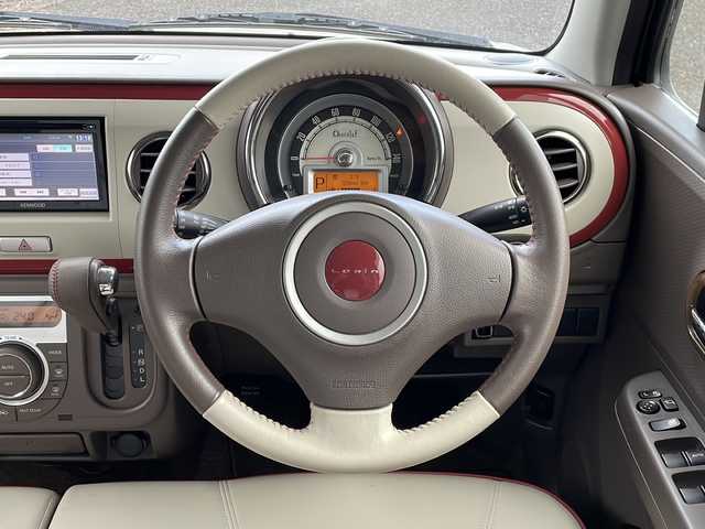 スズキ ラパン ショコラ X 新潟県 2013(平25)年 5.3万km シャンパンピンクPM 社外SDナビ(MDV-L300)/CD/DVD/ワンセグテレビ/革シート/ベンチシート/スマートキー/プッシュスタート/キセノンヘッドライト/オートライト/アイドリングストップ