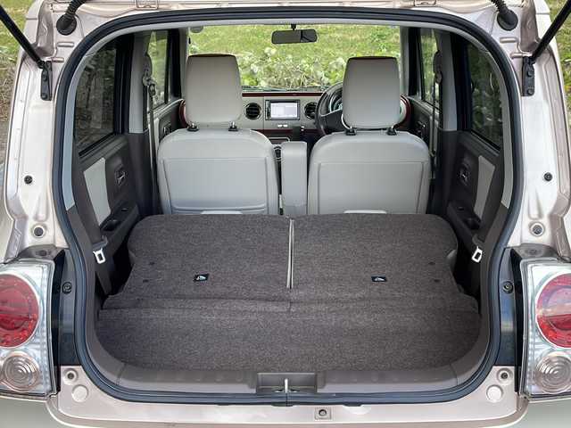 スズキ ラパン ショコラ X 新潟県 2013(平25)年 5.3万km シャンパンピンクPM 社外SDナビ(MDV-L300)/CD/DVD/ワンセグテレビ/革シート/ベンチシート/スマートキー/プッシュスタート/キセノンヘッドライト/オートライト/アイドリングストップ