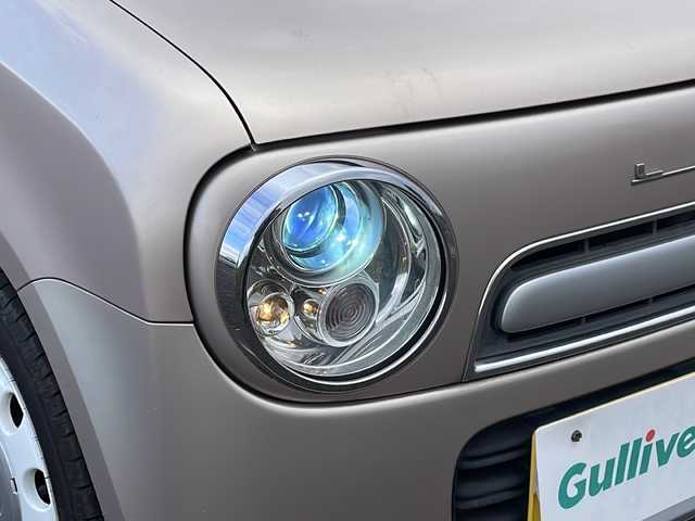 スズキ ラパン ショコラ X 新潟県 2013(平25)年 5.3万km シャンパンピンクPM 社外SDナビ(MDV-L300)/CD/DVD/ワンセグテレビ/革シート/ベンチシート/スマートキー/プッシュスタート/キセノンヘッドライト/オートライト/アイドリングストップ