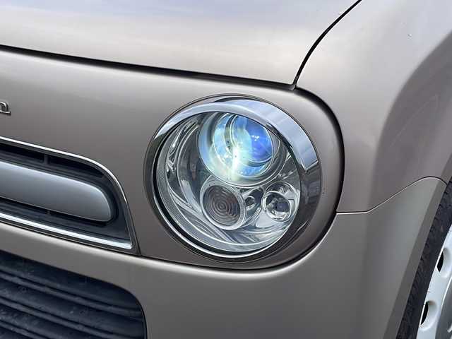 スズキ ラパン ショコラ X 新潟県 2013(平25)年 5.3万km シャンパンピンクPM 社外SDナビ(MDV-L300)/CD/DVD/ワンセグテレビ/革シート/ベンチシート/スマートキー/プッシュスタート/キセノンヘッドライト/オートライト/アイドリングストップ