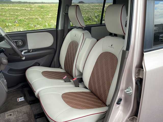 スズキ ラパン ショコラ X 新潟県 2013(平25)年 5.3万km シャンパンピンクPM 社外SDナビ(MDV-L300)/CD/DVD/ワンセグテレビ/革シート/ベンチシート/スマートキー/プッシュスタート/キセノンヘッドライト/オートライト/アイドリングストップ