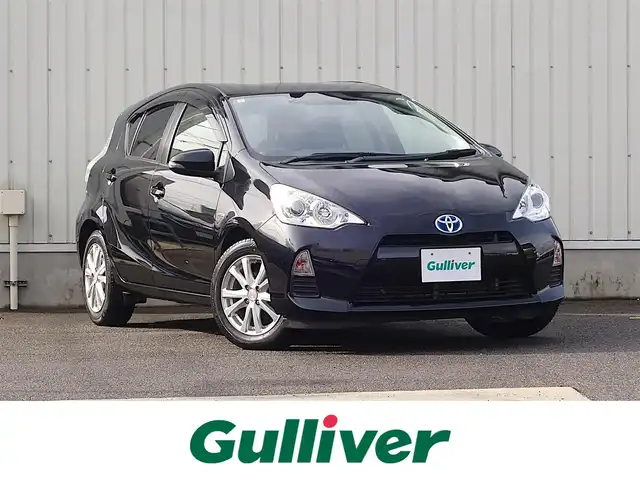 トヨタ アクア G 山形県 2014(平26)年 7.1万km ブラックマイカ 純正HDDナビ/　　【CD DVD BT ワンセグ USB AM/FM】/バックカメラ/オートライト/シートヒーター/15インチアルミホイール/アイドリングストップ/ステアリングスイッチ/電動格納ウィンカーミラー/フロアマット/ドアバイザ―/スマートキー/ETC