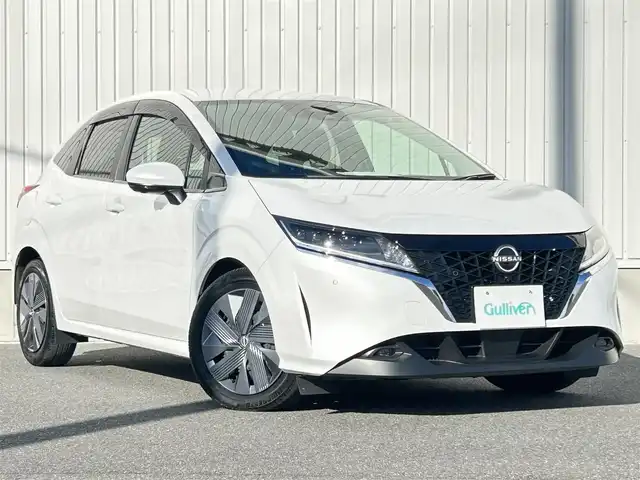 日産 ノート X 群馬県 2023(令5)年 1.9万km ピュアホワイトパール ワンオーナー/寒冷地仕様/純正メモリナビ/　(AM/FM/TV/BT/SD)/アラウンドビューモニター/エマージェンシーブレーキ/レーンキープアシスト/ブラインドスポットモニター/ふらつき警報/スマートルームミラー/AUTOライト/AUTOハイビーム/純正フロアマット/純正ドアバイザー/前席シートヒーター/ステアリングヒーター/LEDヘッドライト/取扱説明書/保証書/スペアキー