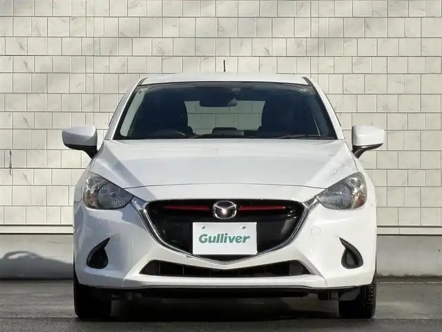 マツダ デミオ XD 岩手県 2015(平27)年 8.5万km スノーフレイクホワイトパールマイカ 禁煙車/4WD/ディーゼル/社外エンジンスターター/純正ナビ/→Bluetooth/FM/AM/AUX/USB/ステアリングスイッチ/横滑り防止装置/トノカバー/〇プッシュスタート/〇電動格納ミラー/〇ウィンカーミラー/〇ドアバイザー/〇フロアマット/〇シガーソケット/〇スマートキー/スペアキー