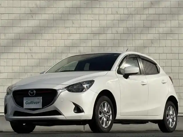 マツダ デミオ XD 岩手県 2015(平27)年 8.5万km スノーフレイクホワイトパールマイカ 禁煙車/4WD/ディーゼル/社外エンジンスターター/純正ナビ/→Bluetooth/FM/AM/AUX/USB/ステアリングスイッチ/横滑り防止装置/トノカバー/〇プッシュスタート/〇電動格納ミラー/〇ウィンカーミラー/〇ドアバイザー/〇フロアマット/〇シガーソケット/〇スマートキー/スペアキー