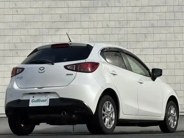 マツダ デミオ XD 岩手県 2015(平27)年 8.5万km スノーフレイクホワイトパールマイカ 禁煙車/4WD/ディーゼル/社外エンジンスターター/純正ナビ/→Bluetooth/FM/AM/AUX/USB/ステアリングスイッチ/横滑り防止装置/トノカバー/〇プッシュスタート/〇電動格納ミラー/〇ウィンカーミラー/〇ドアバイザー/〇フロアマット/〇シガーソケット/〇スマートキー/スペアキー