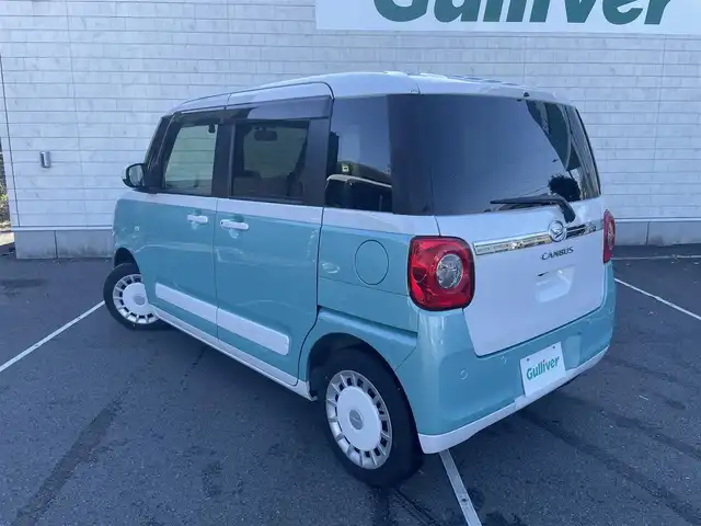 ダイハツ ムーヴ キャンバス ストライプス G 静岡県 2023(令5)年 1.4万km シャイニングホワイトパール/ファインミントメタリック 純正ナビ/　（Bluetooth/DVD/CD）/フルセグTV/バックカメラ/スマートアシスト/衝突被害軽減システム/レーンキープアシスト/前後コーナーセンサー/両側パワースライドドア/前席シートヒーター/保温機能付きカップホルダー/電動パーキングブレーキ/オートブレーキホールド/ETC/前方ドライブレコーダー/LEDヘッドライト/プッシュスタート/スマートキー/スペアキー1本有り/純正フロアマット/取扱説明書/保証書