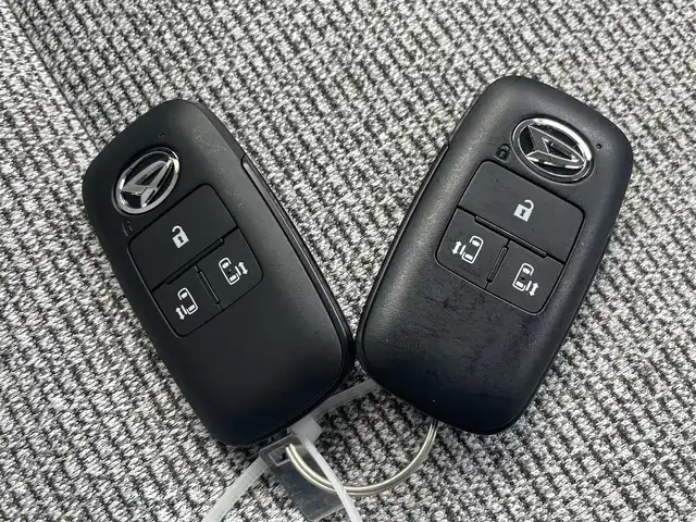 ダイハツ ムーヴ キャンバス ストライプス G 静岡県 2023(令5)年 1.4万km シャイニングホワイトパール/ファインミントメタリック 純正ナビ/　（Bluetooth/DVD/CD）/フルセグTV/バックカメラ/スマートアシスト/衝突被害軽減システム/レーンキープアシスト/前後コーナーセンサー/両側パワースライドドア/前席シートヒーター/保温機能付きカップホルダー/電動パーキングブレーキ/オートブレーキホールド/ETC/前方ドライブレコーダー/LEDヘッドライト/プッシュスタート/スマートキー/スペアキー1本有り/純正フロアマット/取扱説明書/保証書