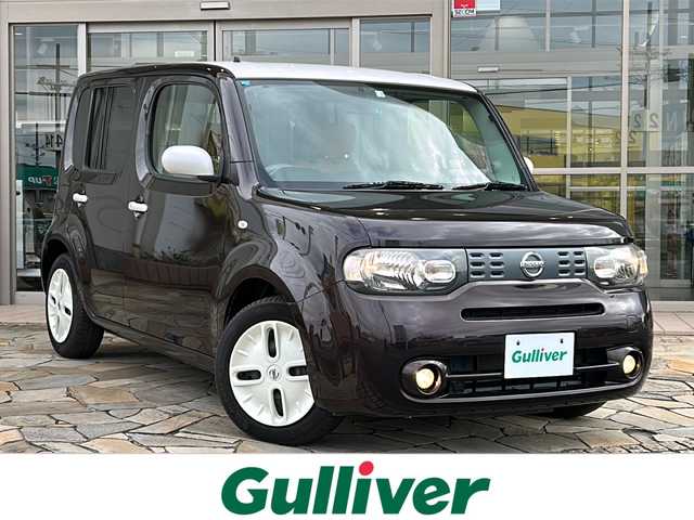 日産 キューブ 15X Vセレクション 静岡県 2016(平28)年 6.2万km ビターショコラ 2トーン 純正ナビ/・FM/AM/・フルセグTV/・CD/DVD/・Bluetooth/主要装備/・ヴィンテージキャメルインテリア/・バックカメラ/・アイドリングストップ/・ステアリングリモコン/・横滑り防止装置/・２トーンカラー/・純正ホイールキャップ/・オートライト/・フォグランプ/・プッシュスタート/・電格ミラー/・純正フロアマット