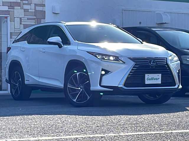 レクサス ＲＸ 450hL 徳島県 2018(平30)年 9.8万km ソニッククォーツ 純正ナビ/（Bluetooth/フルセグ/CD/DVD/AM/FM/SD/USB/AUX）/アラウンドビューモニター/黒革シート/レーダークルーズコントロール/1.2列目シートヒーター/シートベンチレーション（D+N席）/パワーシート（D+N席）/D席メモリー機能付き/ステアリングヒーター/パワーバックドア/ブラインドスポットモニター〔BSM〕/レーンキープアシスト〔LKA〕/クリアランスソナー/後席サンシェード/ヘッドアップディスプレイ〔HUD〕/三眼LEDヘッドライト/オートハイビーム/フォグライト/ドライブレコーダー/純正AW/純正フロアマット/ETC2.0/カードキー