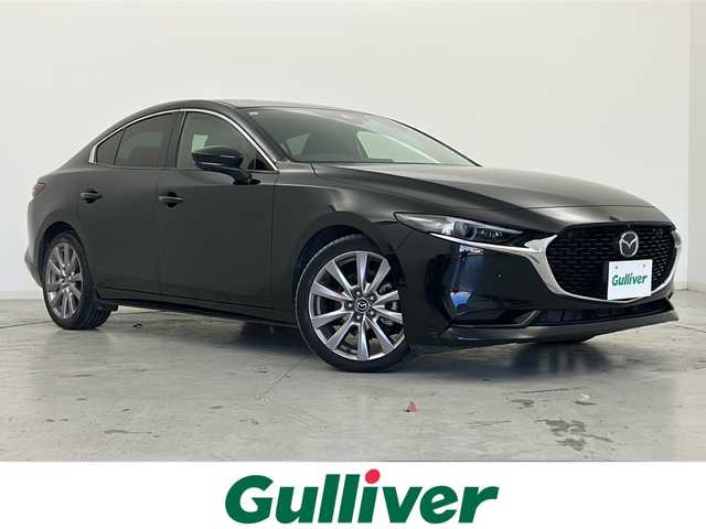 マツダ マツダ３セダン 宮城県 2019(令1)年 6.4万km ジェットブラックマイカ 禁煙車/i-ACTIVSENSE/・スマートブレーキサポート/・ブラインドスポットモニター/・アダプティブLEDヘッドライト/・クルージング＆トラフィックサポート/・マツダレーダークルーズコントロール/・レーンキープアシストシステム/・アイストップ/・トラクションコントロールシステム/ヘッドアップディスプレイ/マツダコネクトナビ/（BT.AM.FM.CD.DVD.USB.HDMI）/全周囲カメラ/フルセグテレビ/電動パーキングブレーキ/AUTOHOLD/ETC/前席シートヒーター/運転席パワーシート/シートメモリー/ステアリングヒーター/パドルシフト/革巻きステアリング/ステアリングスイッチ/プッシュスタート/スマートキー/純正18インチアルミホイール/LEDヘッドライト