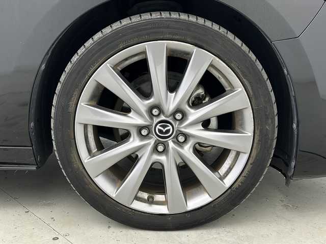 マツダ マツダ３セダン 宮城県 2019(令1)年 6.4万km ジェットブラックマイカ 禁煙車/i-ACTIVSENSE/・スマートブレーキサポート/・ブラインドスポットモニター/・アダプティブLEDヘッドライト/・クルージング＆トラフィックサポート/・マツダレーダークルーズコントロール/・レーンキープアシストシステム/・アイストップ/・トラクションコントロールシステム/ヘッドアップディスプレイ/マツダコネクトナビ/（BT.AM.FM.CD.DVD.USB.HDMI）/全周囲カメラ/フルセグテレビ/電動パーキングブレーキ/AUTOHOLD/ETC/前席シートヒーター/運転席パワーシート/シートメモリー/ステアリングヒーター/パドルシフト/革巻きステアリング/ステアリングスイッチ/プッシュスタート/スマートキー/純正18インチアルミホイール/LEDヘッドライト