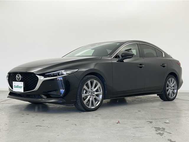 マツダ マツダ３セダン 宮城県 2019(令1)年 6.4万km ジェットブラックマイカ 禁煙車/i-ACTIVSENSE/・スマートブレーキサポート/・ブラインドスポットモニター/・アダプティブLEDヘッドライト/・クルージング＆トラフィックサポート/・マツダレーダークルーズコントロール/・レーンキープアシストシステム/・アイストップ/・トラクションコントロールシステム/ヘッドアップディスプレイ/マツダコネクトナビ/（BT.AM.FM.CD.DVD.USB.HDMI）/全周囲カメラ/フルセグテレビ/電動パーキングブレーキ/AUTOHOLD/ETC/前席シートヒーター/運転席パワーシート/シートメモリー/ステアリングヒーター/パドルシフト/革巻きステアリング/ステアリングスイッチ/プッシュスタート/スマートキー/純正18インチアルミホイール/LEDヘッドライト