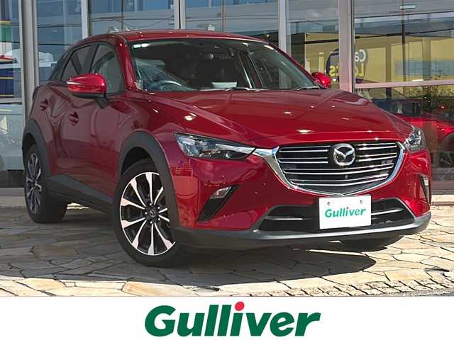 マツダ ＣＸ－３ 15S ツーリング 静岡県 2023(令5)年 2.1万km ソウルレッドクリスタルM 純正ナビ（FM AM aha Stitcher Bluetooth USB CD AUX DVD フルセグTV）/全方位カメラ/バックカメラ/ドライブレコーダー/MTモード付きAT/BSM/電動パーキング/オートホールド/ステアリングリモコン/前後コーナーセンサー/純正アルミホイール/W＋サイドエアバッグ/カーテンエアバッグ/LEDヘッドライト/スマートキー/スペアキー×１/プッシュスタート