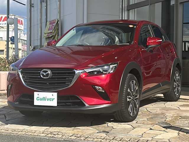 マツダ ＣＸ－３ 15S ツーリング 静岡県 2023(令5)年 2.1万km ソウルレッドクリスタルM 純正ナビ（FM AM aha Stitcher Bluetooth USB CD AUX DVD フルセグTV）/全方位カメラ/バックカメラ/ドライブレコーダー/MTモード付きAT/BSM/電動パーキング/オートホールド/ステアリングリモコン/前後コーナーセンサー/純正アルミホイール/W＋サイドエアバッグ/カーテンエアバッグ/LEDヘッドライト/スマートキー/スペアキー×１/プッシュスタート