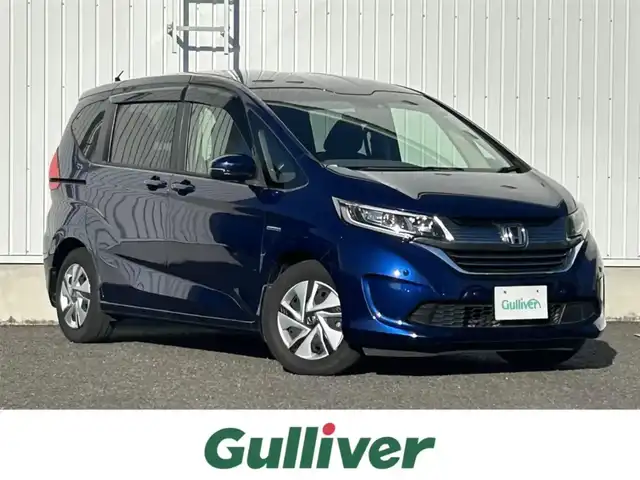 ホンダ フリード ハイブリット G ホンダセンシング 熊本県 2017(平29)年 6.1万km コバルトブルーパール 【DNクレーム無効】/純正SDナビ/フルセグTV/BT/AM/FM/DVD/バックカメラ/ホンダセンシング/・CMBS/・ACC/・先行発進/・路外逸脱抑制システム/レーンキープアシスト/標識認識システム/オートライト/クリアランスソナー/車両接近警告/ステアリングスイッチ/電動格納ミラー/・ウィンカーミラー/ドアバイザー/両側パワースライドドア/ドライブレコーダー/ビルトインETC/プッシュスタート/スマートキー
