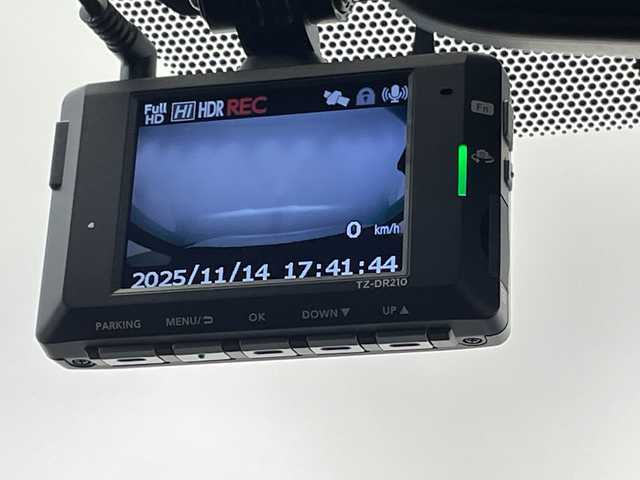 トヨタ ノア ハイブリッド S－Z 栃木県 2025(令7)年 0.3万km ホワイトパールクリスタルシャイン 純正ディスプレイオーディオ/（Bluetooth/USB）/全方位カメラ/モデリスタフルエアロ/トヨタセーフティセンス/プラインドスポットモニター/前後コーナーセンサー/ビルトインETC/両側パワースライドドア/ハーフレザーシート/シートヒーター/オートライト/LEDヘッドライト/AC100V電源/スマートキー/プッシュスタート/革巻きステアリング/ウインカーミラー/電動格納ミラー/純正アルミホイール/純正フロアマット