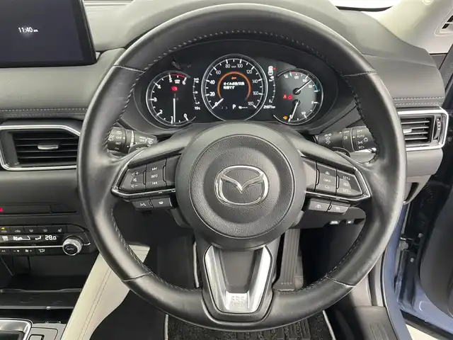 マツダ ＣＸ－５ XD Lパッケージ 富山県 2022(令4)年 2.2万km ポリメタルグレーM 4WD/純正ナビ（AM/FM/SD/USB/BT）/フルセグTV/アラウンドビューモニター/ヘッドアップディスプレイ/衝突被害軽減ブレーキ/アダプティブクルーズコントロール/レーンキープアシスト/ブラインドスポットモニター/コーナーセンサー前後/オートLEDヘッドライト/電動リアゲート/白革シート/前席シートヒーター/前席パワーシート/スマートキー/プッシュスタート/パドルシフト/純正フロアマット/アイドリングストップ/保証書