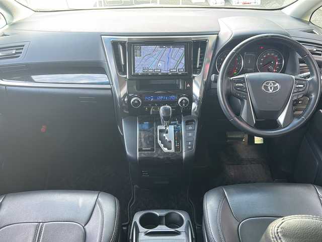 トヨタ ヴェルファイア Z 広島県 2018(平30)年 8.2万km ホワイトパールクリスタルシャイン 禁煙/純正9インチナビ/CD/DVD/DTV/Bluetooth/バックカメラ/純正フリップダウンモニター/F/S/Rエアロ/レーダークルーズコントロール/両側パワースライドドア/LDA/LEDオートライト/オートマチックハイビーム/クリアランスソナー/ビルトインETC/ドライブレコーダー/スマートキー/プッシュスタート/フロアマット/純正ドアバイザー/純正アルミホイール