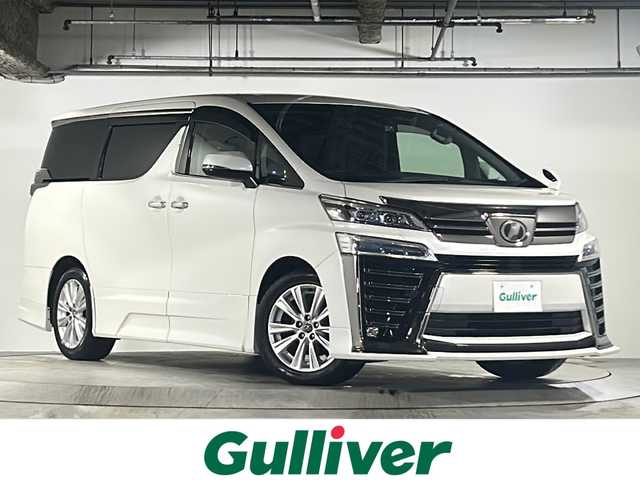 トヨタ ヴェルファイア Z 広島県 2018(平30)年 8.2万km ホワイトパールクリスタルシャイン 禁煙/純正9インチナビ/CD/DVD/DTV/Bluetooth/バックカメラ/純正フリップダウンモニター/F/S/Rエアロ/レーダークルーズコントロール/両側パワースライドドア/LDA/LEDオートライト/オートマチックハイビーム/クリアランスソナー/ビルトインETC/ドライブレコーダー/スマートキー/プッシュスタート/フロアマット/純正ドアバイザー/純正アルミホイール