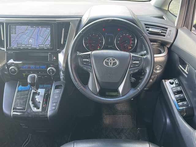 トヨタ ヴェルファイア Z 広島県 2018(平30)年 8.2万km ホワイトパールクリスタルシャイン 禁煙/純正9インチナビ/CD/DVD/DTV/Bluetooth/バックカメラ/純正フリップダウンモニター/F/S/Rエアロ/レーダークルーズコントロール/両側パワースライドドア/LDA/LEDオートライト/オートマチックハイビーム/クリアランスソナー/ビルトインETC/ドライブレコーダー/スマートキー/プッシュスタート/フロアマット/純正ドアバイザー/純正アルミホイール