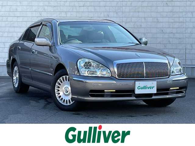 日産 プレジデント ソブリン 群馬県 2010(平22)年 5.7万km ブレードシルバー 純正ＨＤＤナビ　/フリップダウンモニター　/バックカメラ　/後席シートヒーター　/全席パワーシート　/後席マッサージ機能　/白レザーシート　/白＋木目調内装　/クルーズコントロール　/純正１６型ＡＷ　/純正フロアマット/電動格納ミラー/本革ステアリング/スマートキー/ドライブモード切替/シートセットポジションメモリー/純正ビルトインETC/パワーステアリング/１００V充電