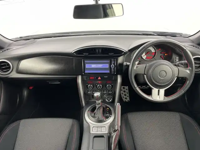 トヨタ ８６ GT 愛知県 2014(平26)年 4.2万km サテンホワイトパール 禁煙車/ワンオーナー/純正７インチナビ/（フルセグＴＶ/ＣＤ/ＤＶＤ/Ｂｌｕｅｔｏｏｔｈ/ＡＭ/ＦＭ）/バックカメラ/ＥＴＣ/パドルシフト/純正１７インチアルミホイール/スマートキー/プッシュスタート/ＨＩＤヘッドライト/フロントフォグランプ/純正フロアマット/横滑り防止装置/オートエアコン/電動格納ミラー